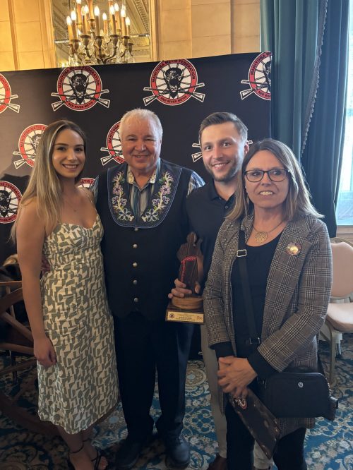 Evan Kastes and family